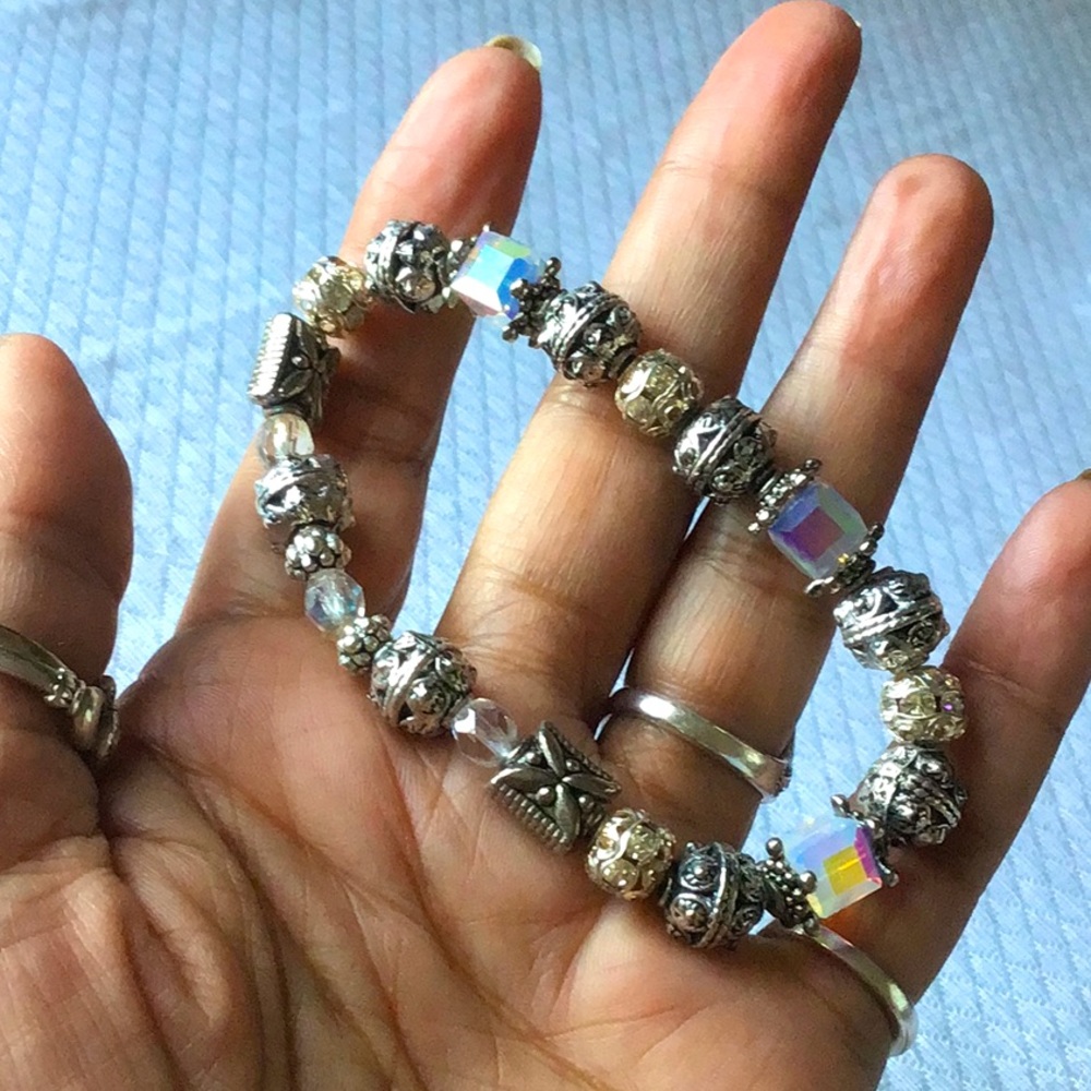 Bracelet,Crystals, Silver Beads Handmade and strung on elasticized cord. 7.5”